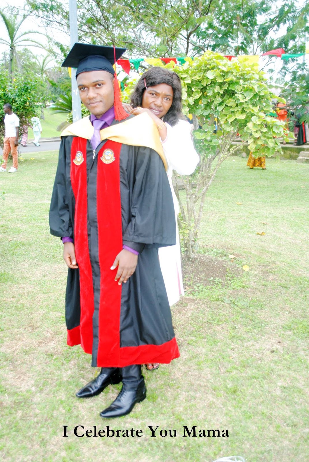 Dr. Melvin Temo with his mother